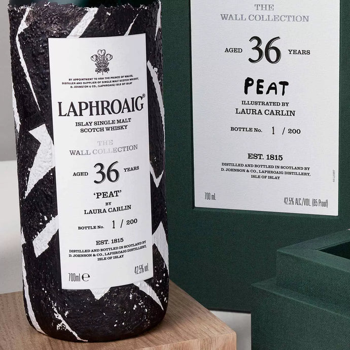 Laphroaig Debuts New Wall Collection With Hand Painted Bottles Made Using Paint From Distillery's Warehouse No. 1